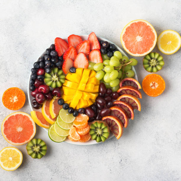 istock Raw fruits berries platter 1059376110