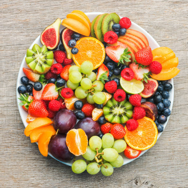 istock Raw fruits berries platter 1059376130