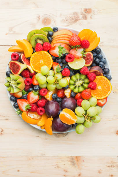 istock Raw fruits berries platter 1059376138