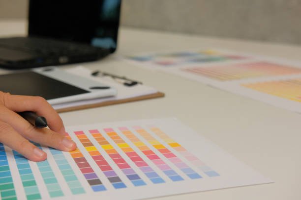 istock graphic interior designer choosing color from swatch sample catalogue palette guide. artist design & idea for creativity project. 1059388092