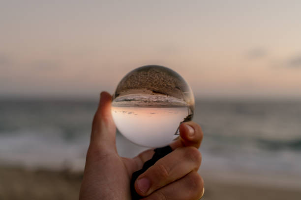 istock Watching the sunset thru a crystal ball 1059388272