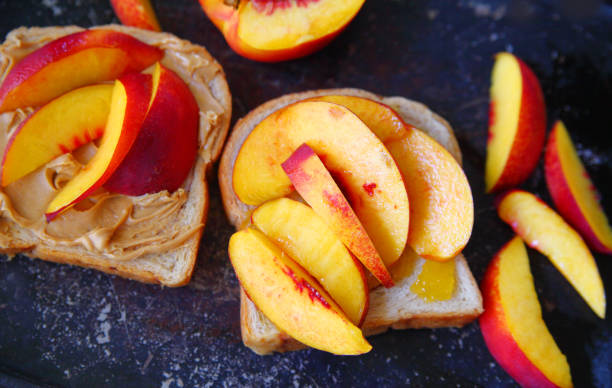 istock Sandwich of peanut butter and nectarines 1059393078