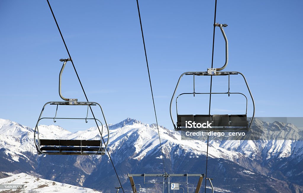 chair lift front view of chair lift moving up and down. Ski Lift Stock Photo