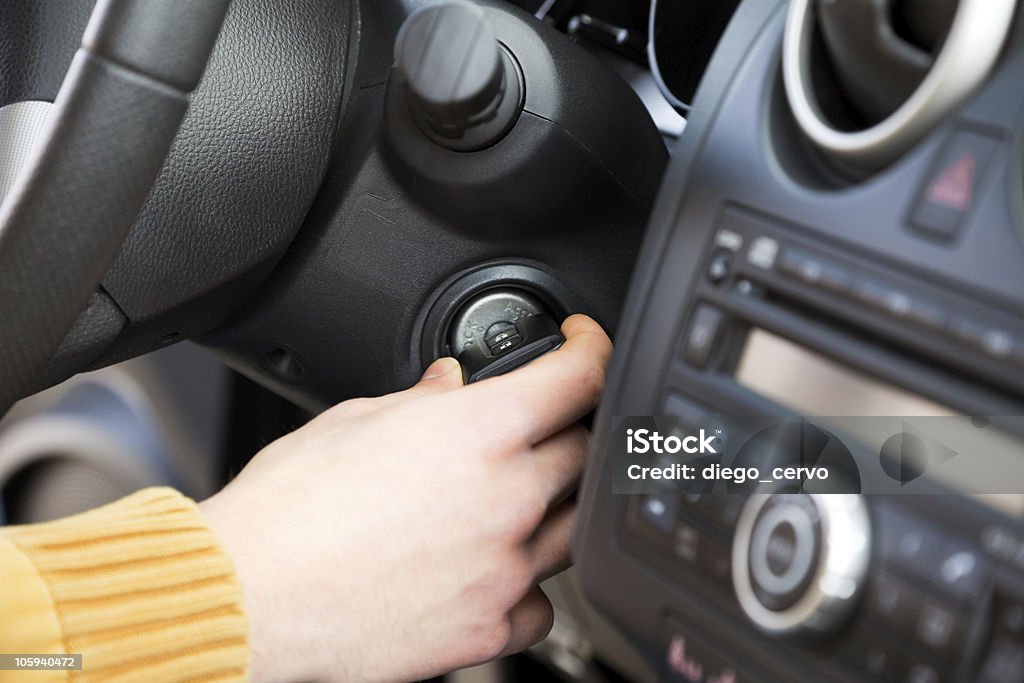 car keys close up of man turning on his car. 20-29 Years Stock Photo