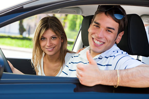 istock Happy young couple going for a car ride 105940480