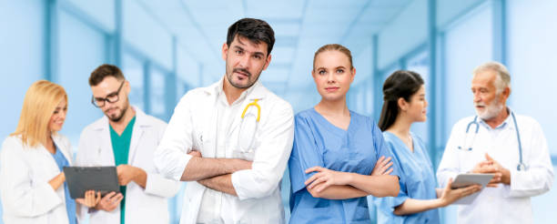 istock Doctor working in hospital with other doctors. 1059410086