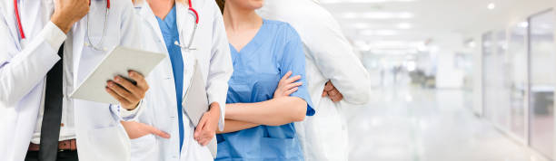 istock Doctor working in hospital with other doctors. 1059417186
