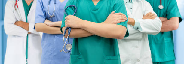 istock Doctor working in hospital with other doctors. 1059417270