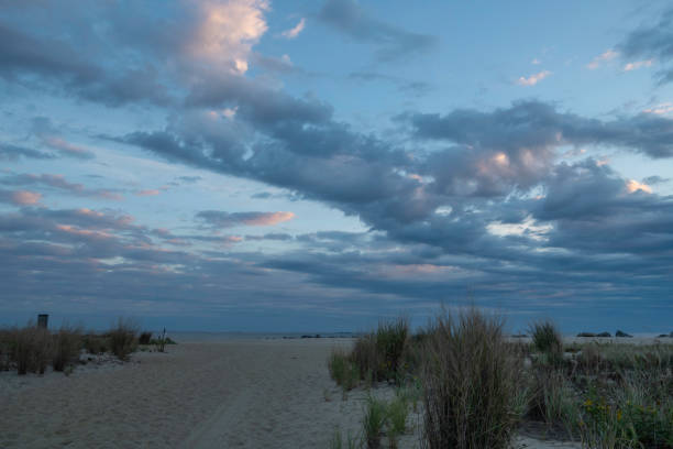 istock Autumn sunrise on the beach 1059417354