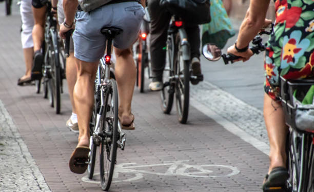 istock Low Section Of People Riding Bicycles On Road 1059422154