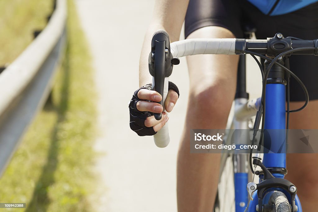 cyclist Cropped view of female cyclist with hands on brakes. Copy space Cycling Stock Photo