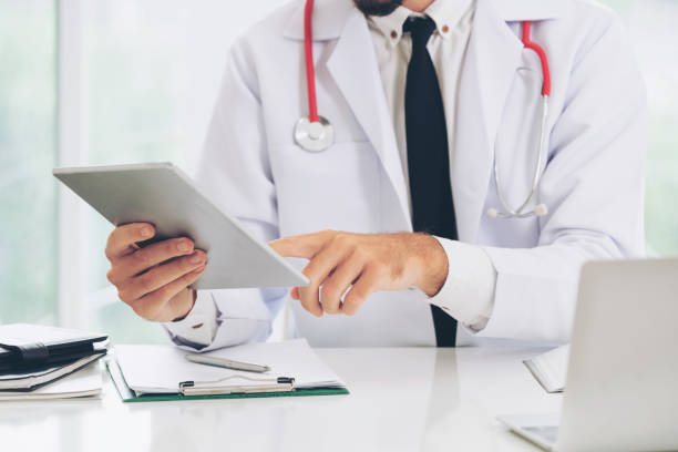 istock Doctor working on tablet computer in the hospital. 1059425564