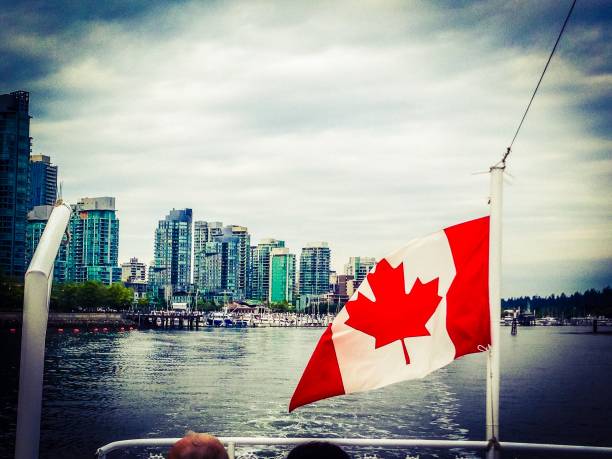 istock Canadian Flag on the water 1059428564