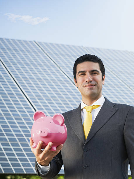 istock businessman and solar panels 105943381