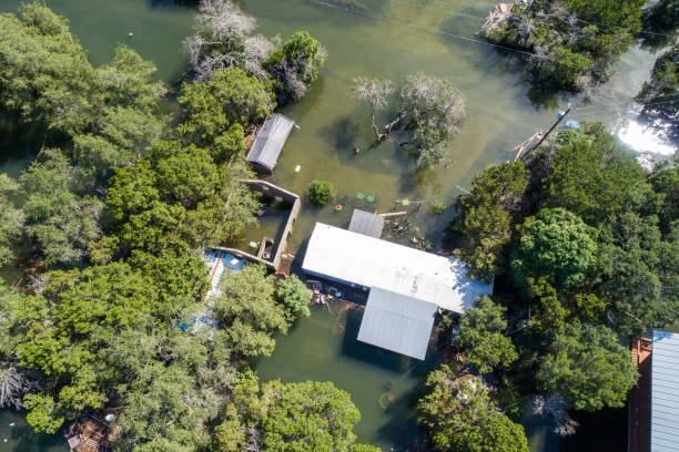 istock Climate change straight down above destroyed house 1059434200