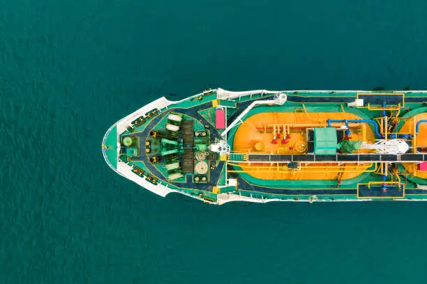Aerial view of sea freight, Green,yellow oil tanker ship, Lpg, Cng at industrial estate Thailand / Crude Oil tanker to Port of Singapore - import export around in the world