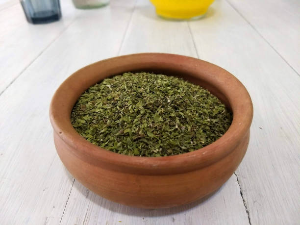 istock Oregano in a small bowl 1059439528