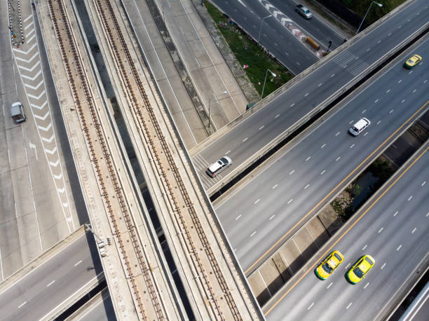 istock Railway tracks / Expressway top view, Road traffic an important infrastructure - Showing passenger trains 1059439890