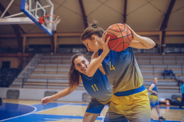 istock Girls basketball game 1059440098