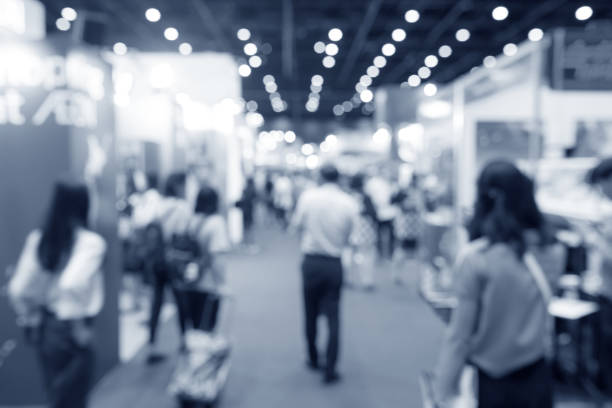 istock Abstract blurred event exhibition with people background, business convention show concept 1059441396