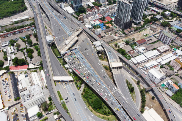 istock Expressway top view, Road traffic an important infrastructure 1059441434