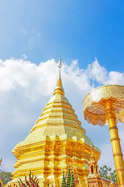 Photo of Golden pagoda and umbrella in Wat Phra That Doi Suthep is the popular tourist destination of Chiang Mai, Thailand.