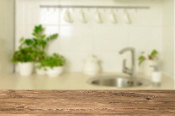 istock Wooden table top on blur interior background 1059470928