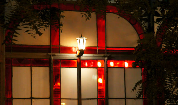 istock Street lamp in the park against wall 1059481966