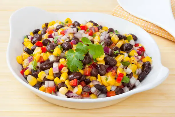 Black Bean and Corn Salad - Mexican style salad of black beans and corn, with a cumin flavoured dressing. Good accompaniment for chilli.