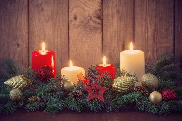 istock Christmas wreath on old dark background 1059490990