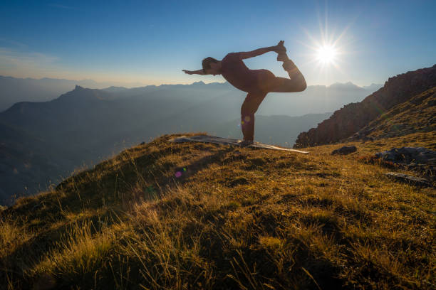 istock Early morning yoga silhouette 1059494882