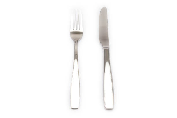 istock Stainless metal Knife and fork kitchenware isolated 1059495426