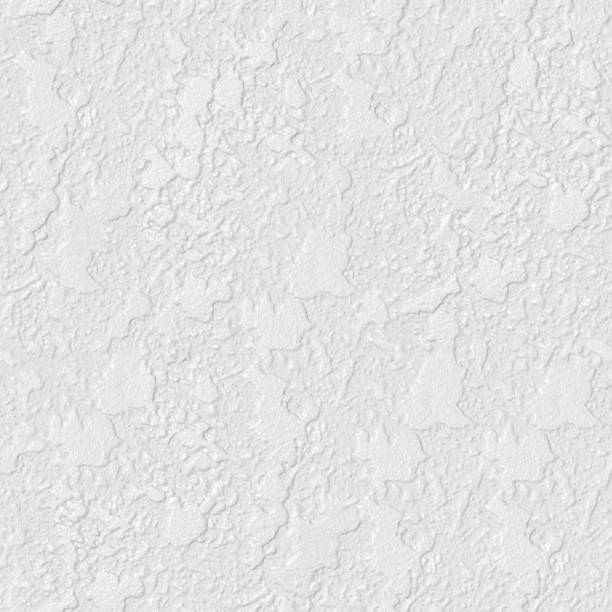 istock Close up surface detail of old rough white plaster wall texture., 1059499696