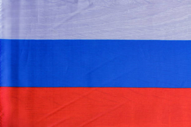 istock National flag of Russia, fabric background texture 1059499698