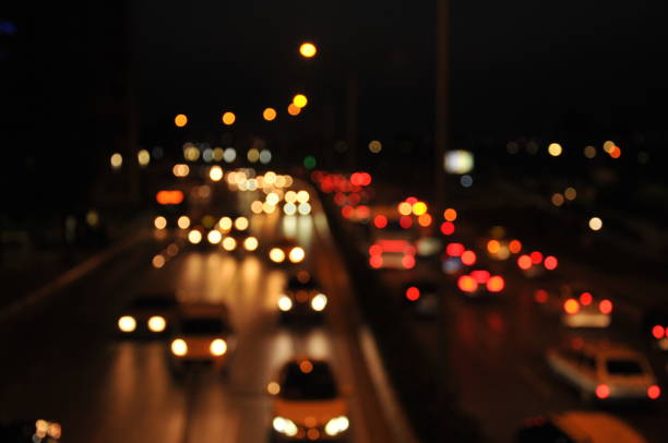 istock car headlights in city 1059499826