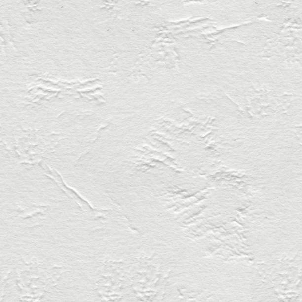 istock White crumpled paper background on macro. Seamless square texture. 1059499850