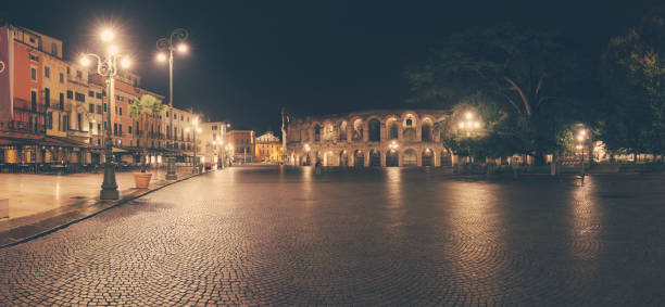 istock Night old Verona illuminated street panorama 1059501492