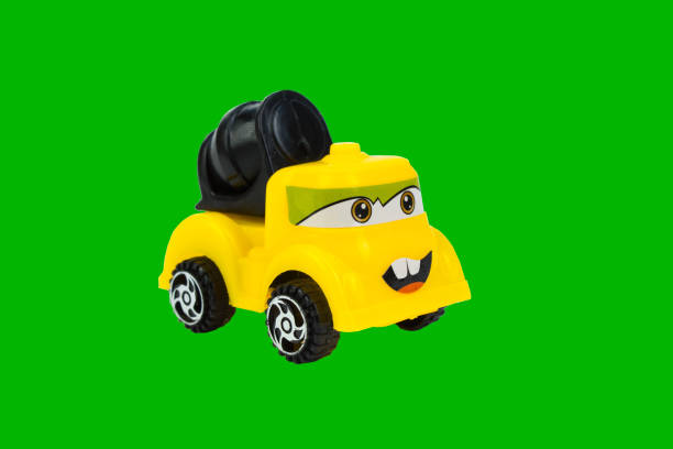 istock Toy cement concrete truck on green background. 1059501856