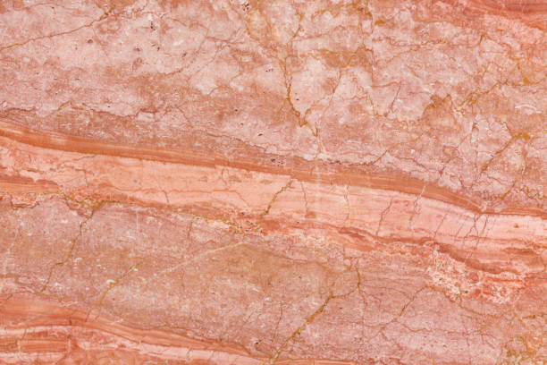 istock Clear red marble texture in natural color. 1059502740