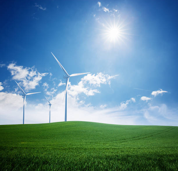 istock Wind turbine and green field 1059507874