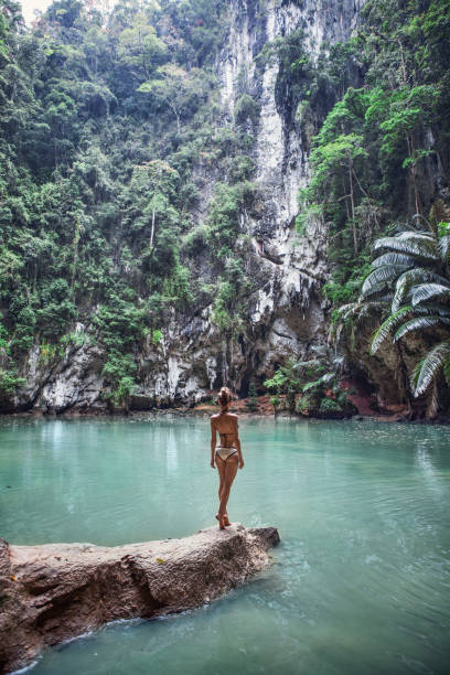 istock Beautiful girl in an empty lagoon 1059508504