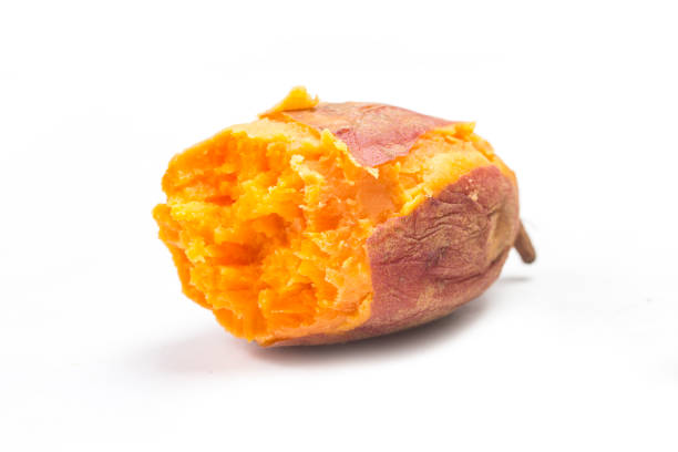 istock Baked sweet potato on white background 1059510864