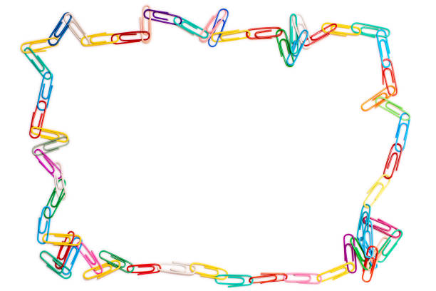 istock Odd frame made of paper clips on white background 1059513182