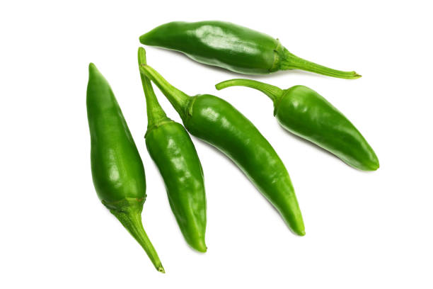 istock green hot chili peppers isolated on white background top view 1059513482