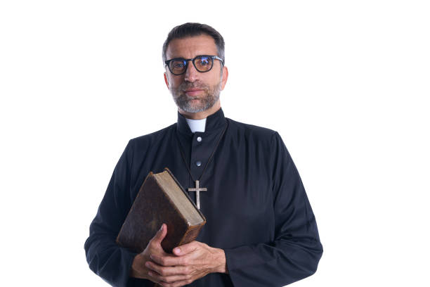 istock Priest portrait with Holy Bible in hands 1059516176