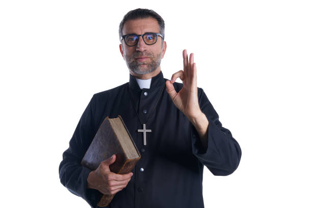istock Priest with ok finger hands sign 1059516202
