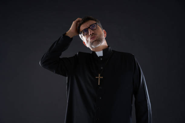 istock Priest male hands in head worried 1059521464