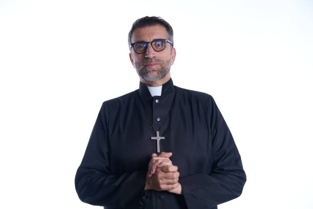 istock Priest pastor portrait praying relaxed 1059522146