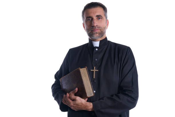istock Priest portrait with Holy Bible in hands 1059522202