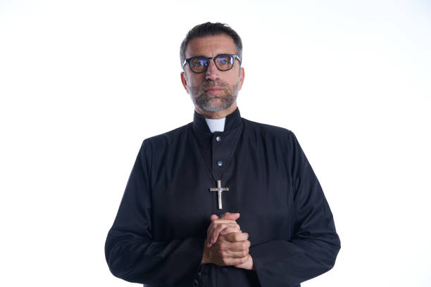 istock Priest pastor portrait praying relaxed 1059522208